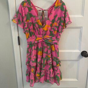 Floral print mini dress with ruffles and cutout back